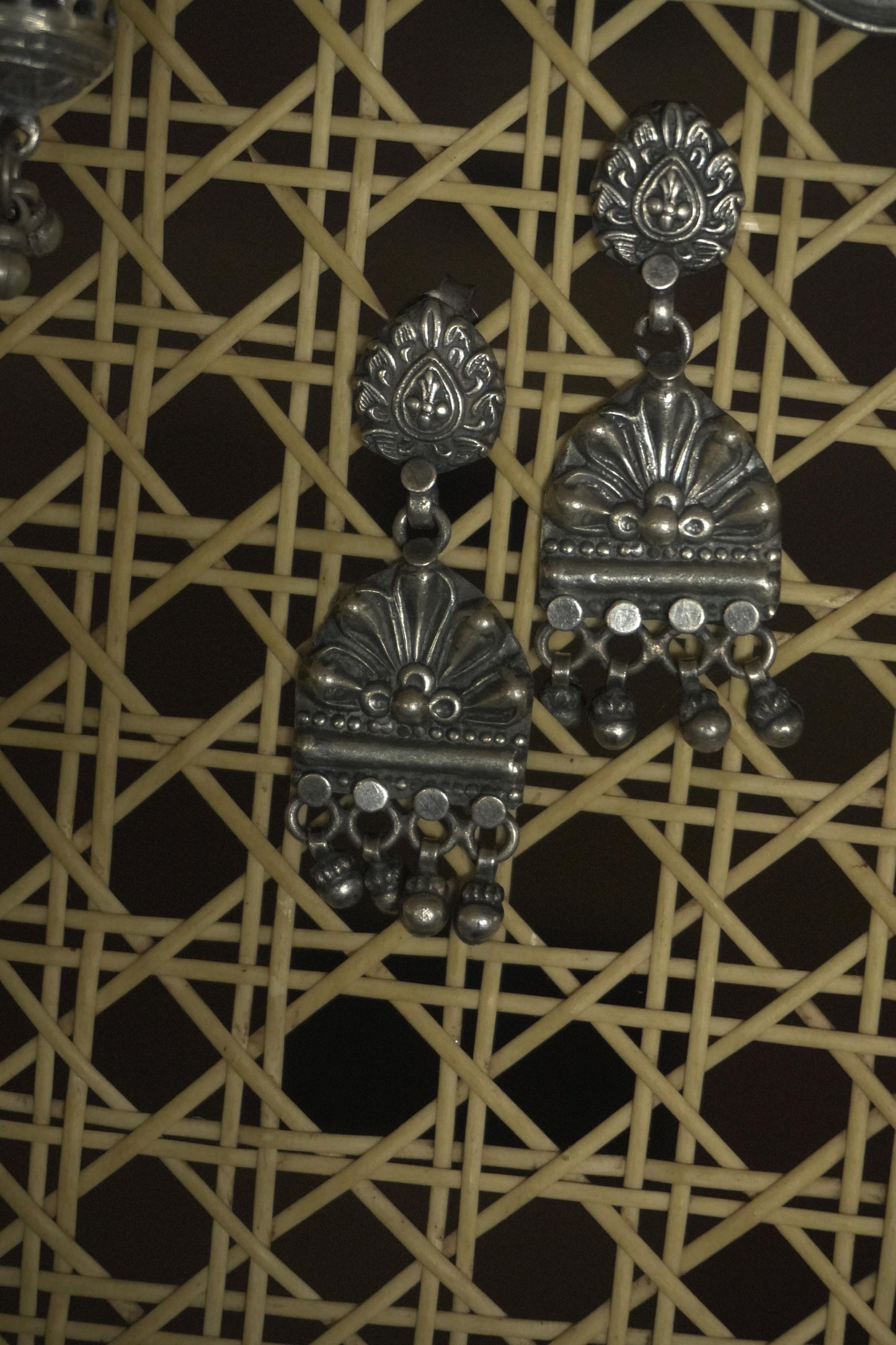 92.5 silver Kvanita tribal silver jewellery earrings with intricate floral and geometric detailing.