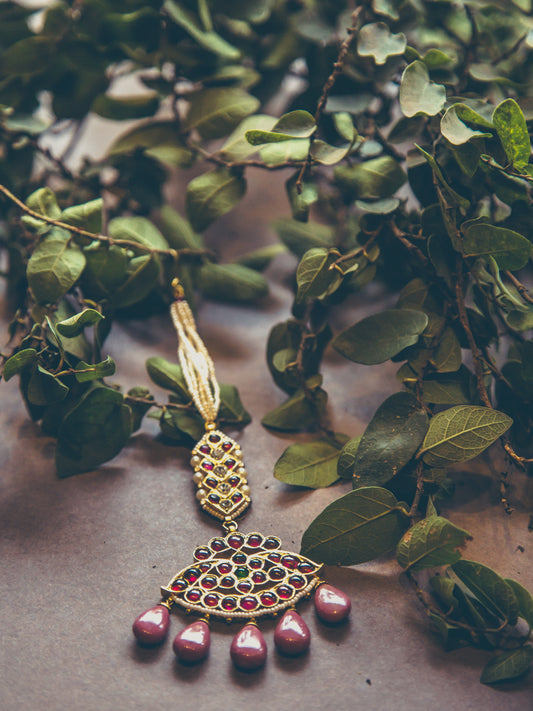 Abharika Maangtika - handcrafted sterling silver temple jewelry maang tikka with 22ct gold leaf, red kemp stones and pearl accents