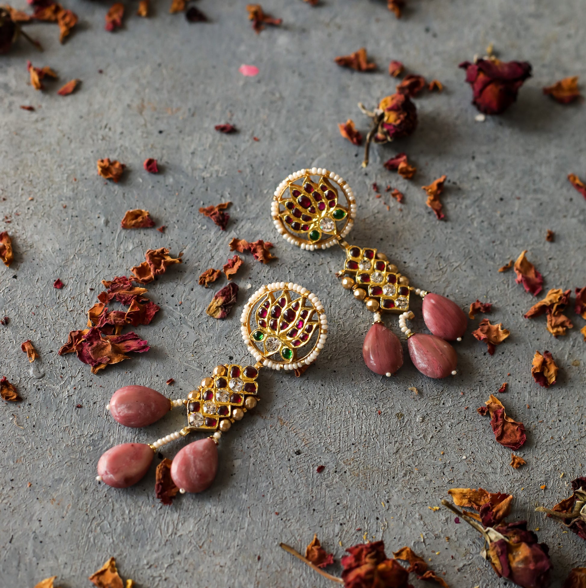 Kai Earrings - handcrafted sterling silver drop earrings with 22ct gold leaf, featuring lotus motif with red kemp stones and pink rhodonite drops