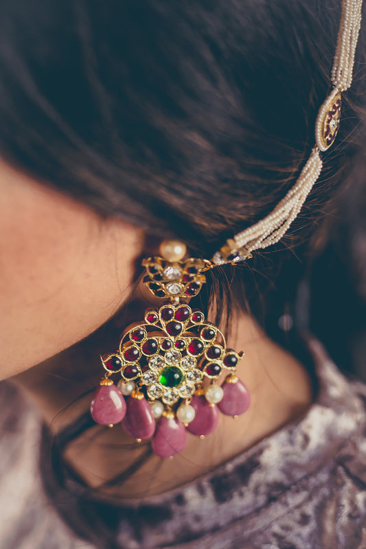 Abharika cascading temple earrings showing detailed craftsmanship and red kemp stone setting by Aaharya makes