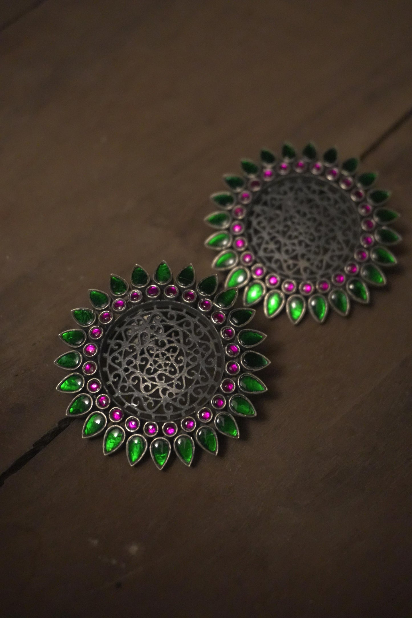 Round tribal silver jewellery earrings with green teardrop and pink oval accents, 92.5 silver.