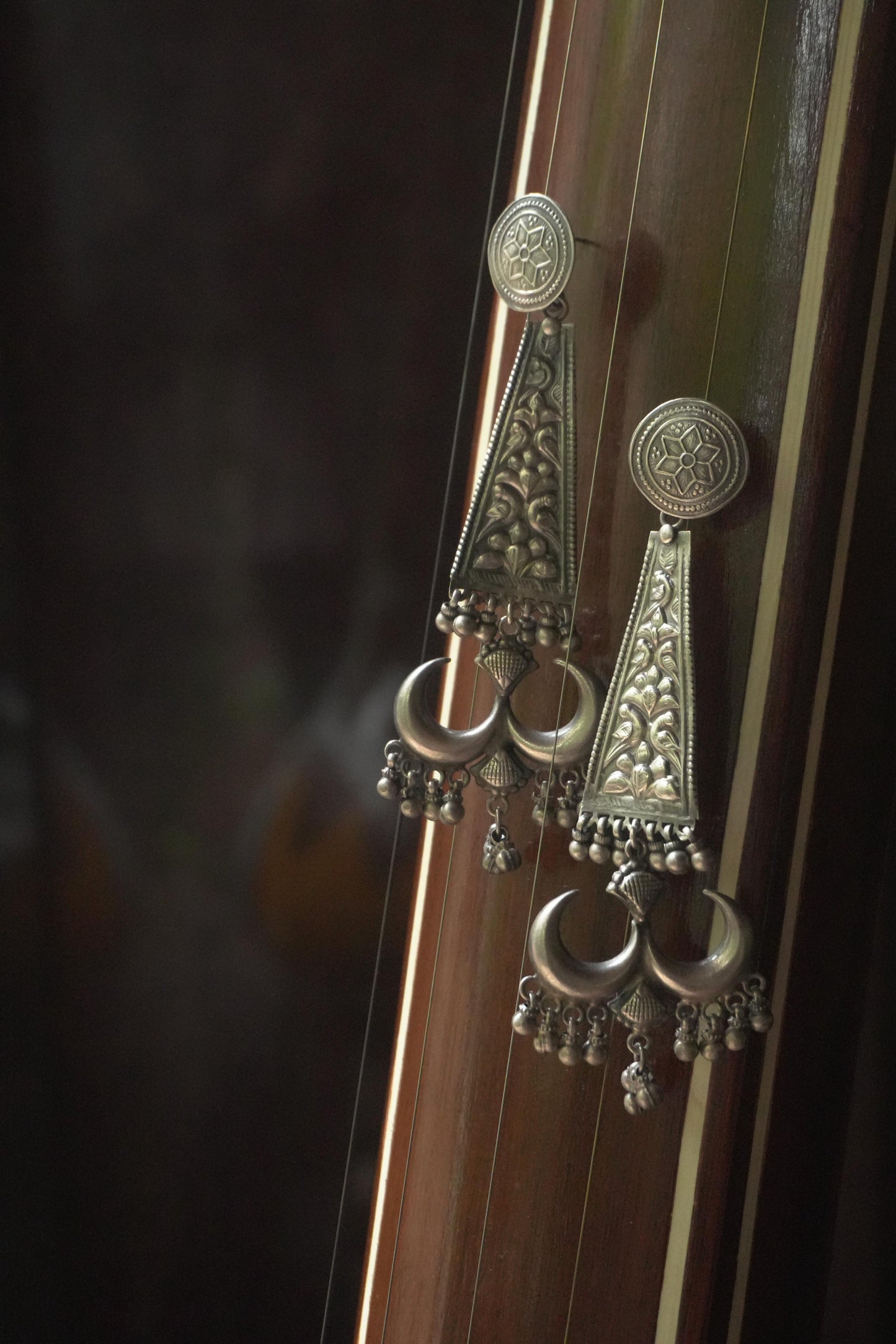 Silver Ravya earrings with intricate tribal silver jewellery design, 92.5 silver detailing.