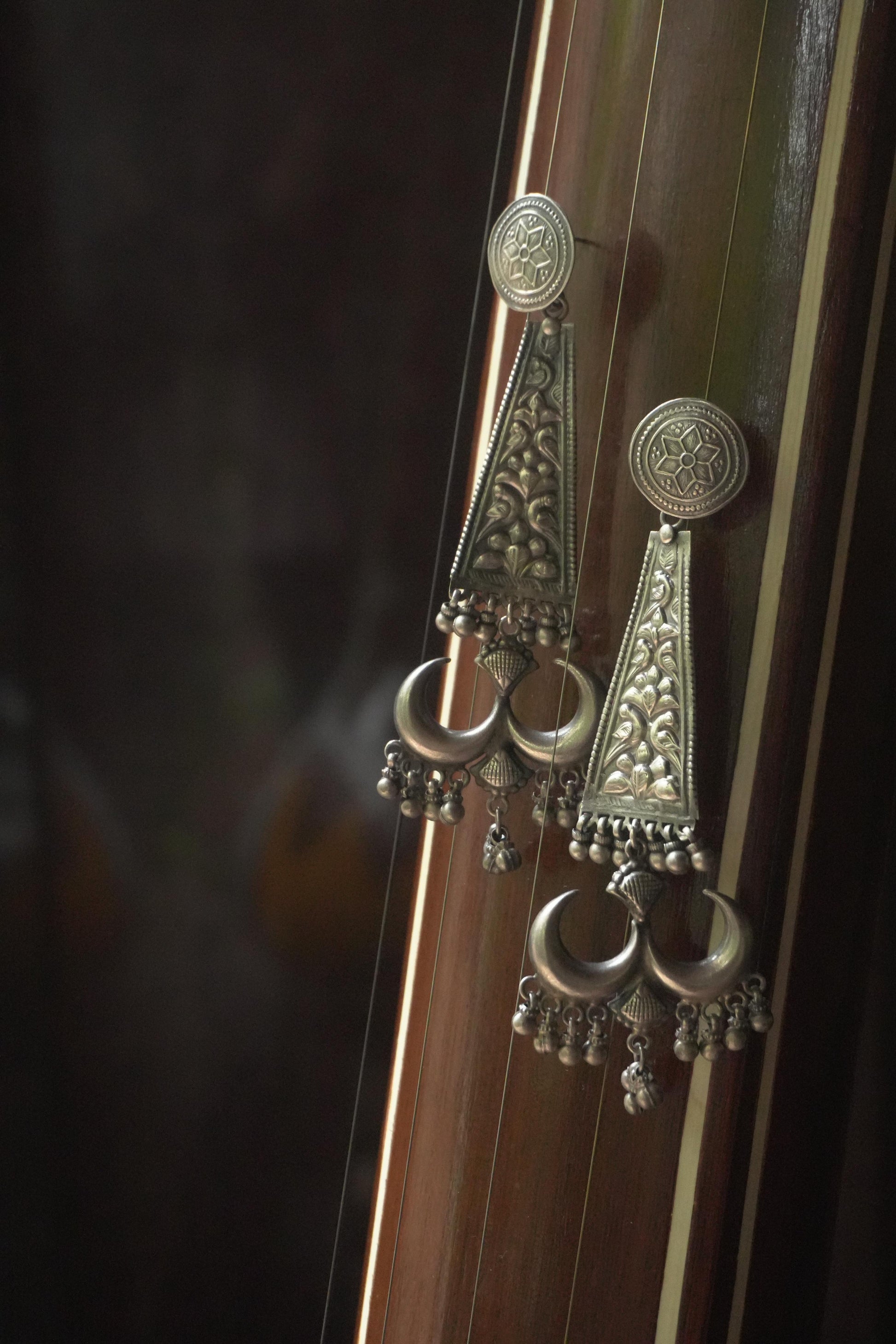 Silver Ravya earrings with intricate tribal silver jewellery design, 92.5 silver detailing.