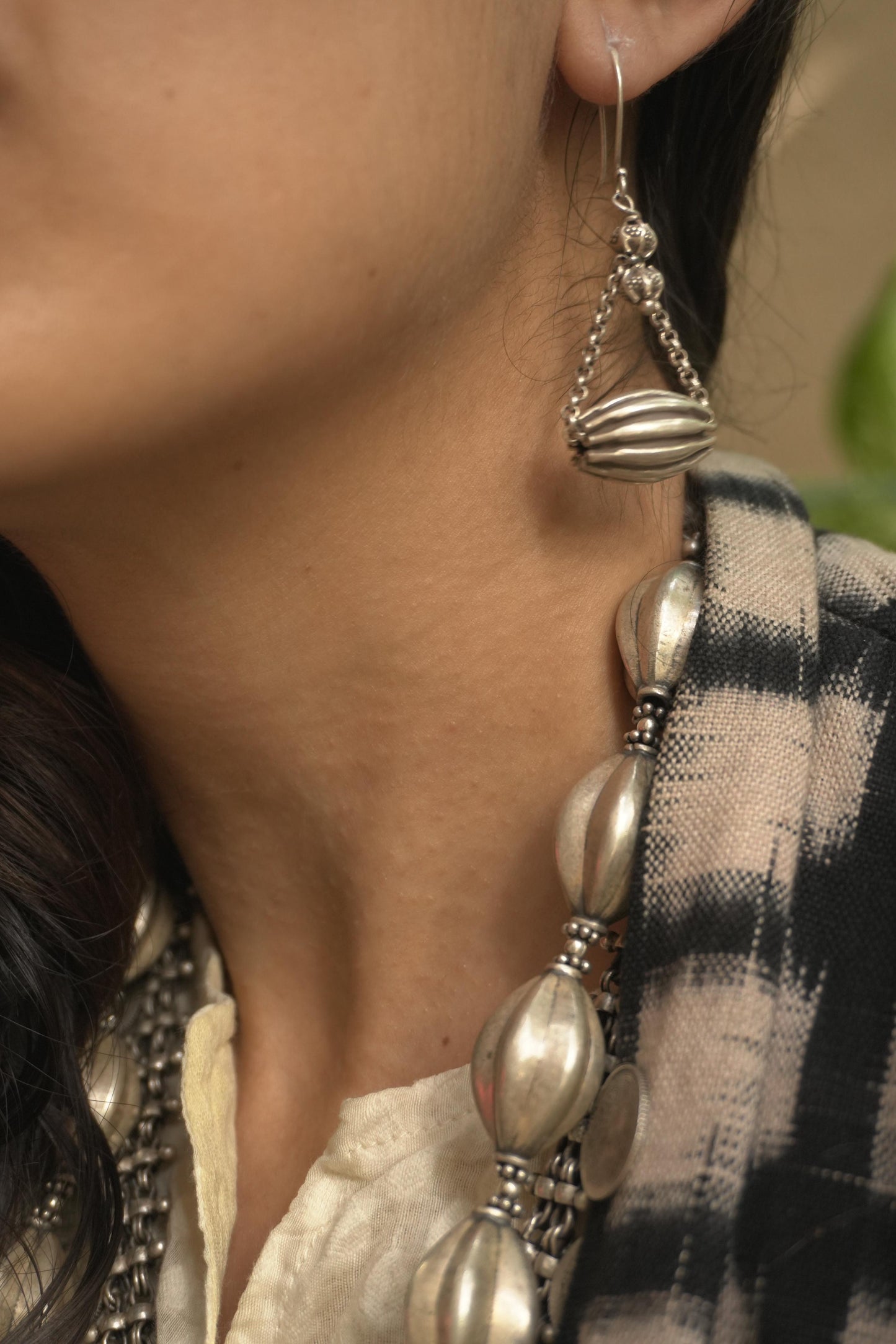 Tribal silver jewellery Tanna Earrings with 92.5 silver intricate bell-shaped design.