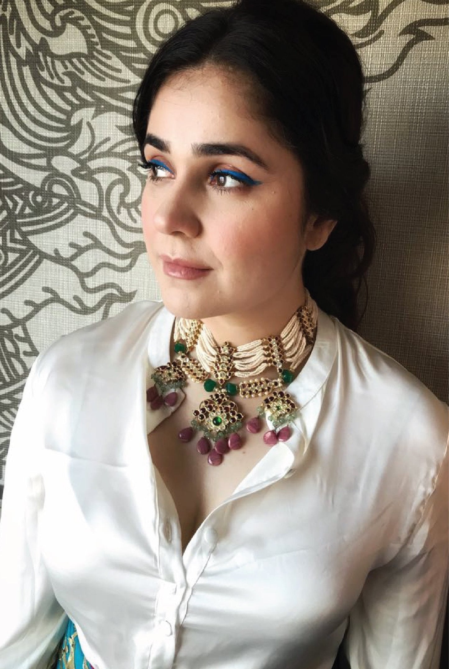 Celebrity Meher Vij wearing Abharika necklace with crisp white shirt - showcasing the temple jewelry’s versatility for contemporary professional styling