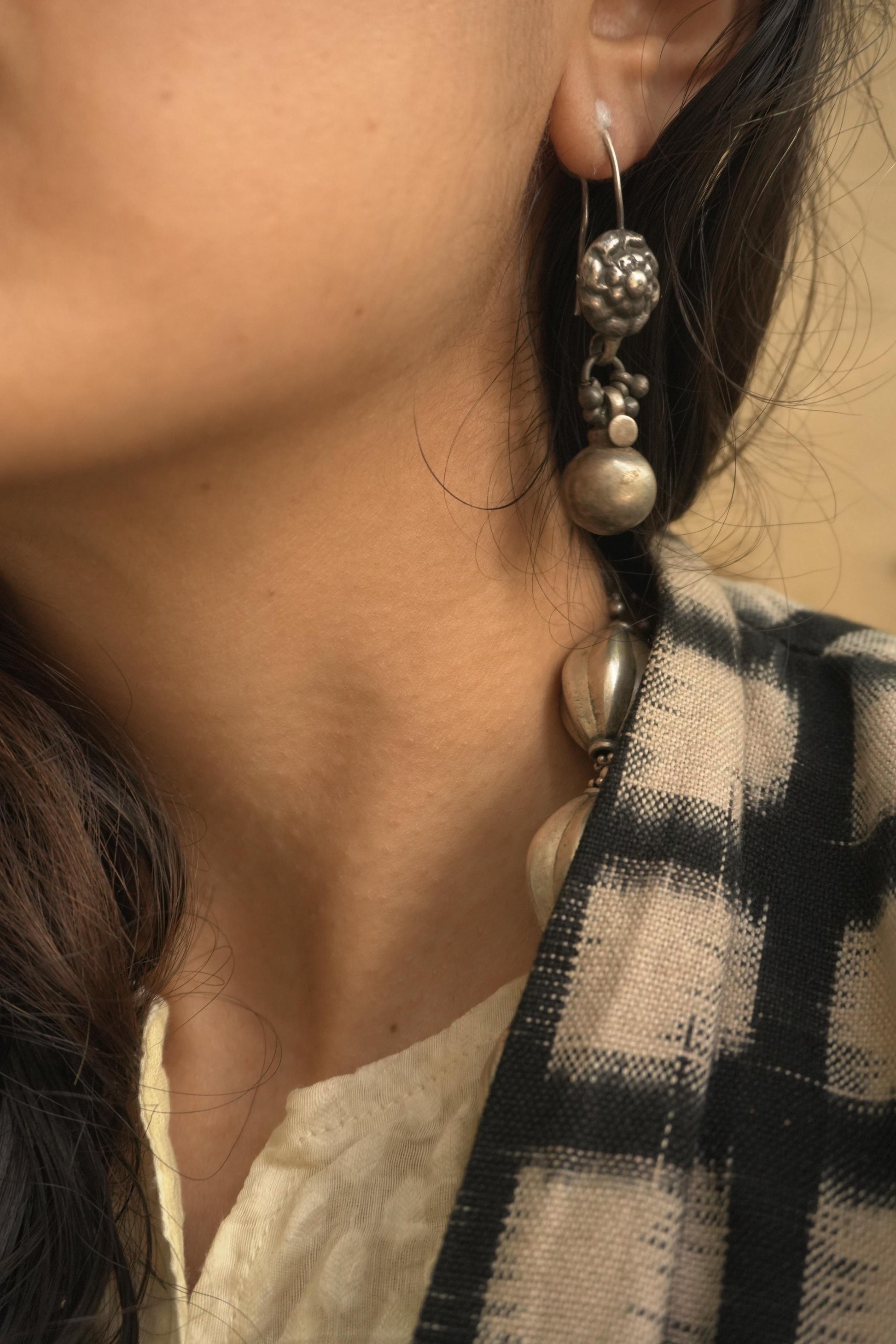 Tribal silver jewellery Manjiri earrings in 92.5 silver with intricate bead and ball design.