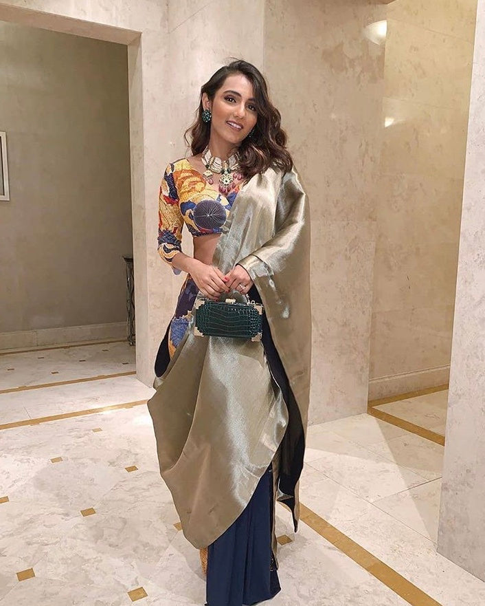 Fashion blogger Masoom Minawala showcasing Abharika temple necklace paired with modern ensemble